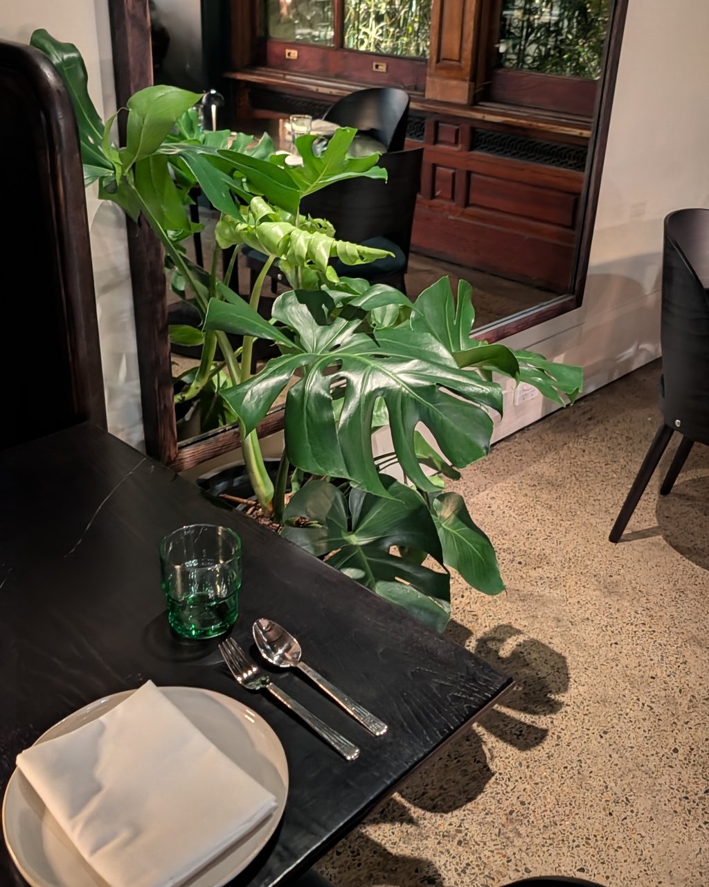 Monstera plant styling in the Ashe dining room