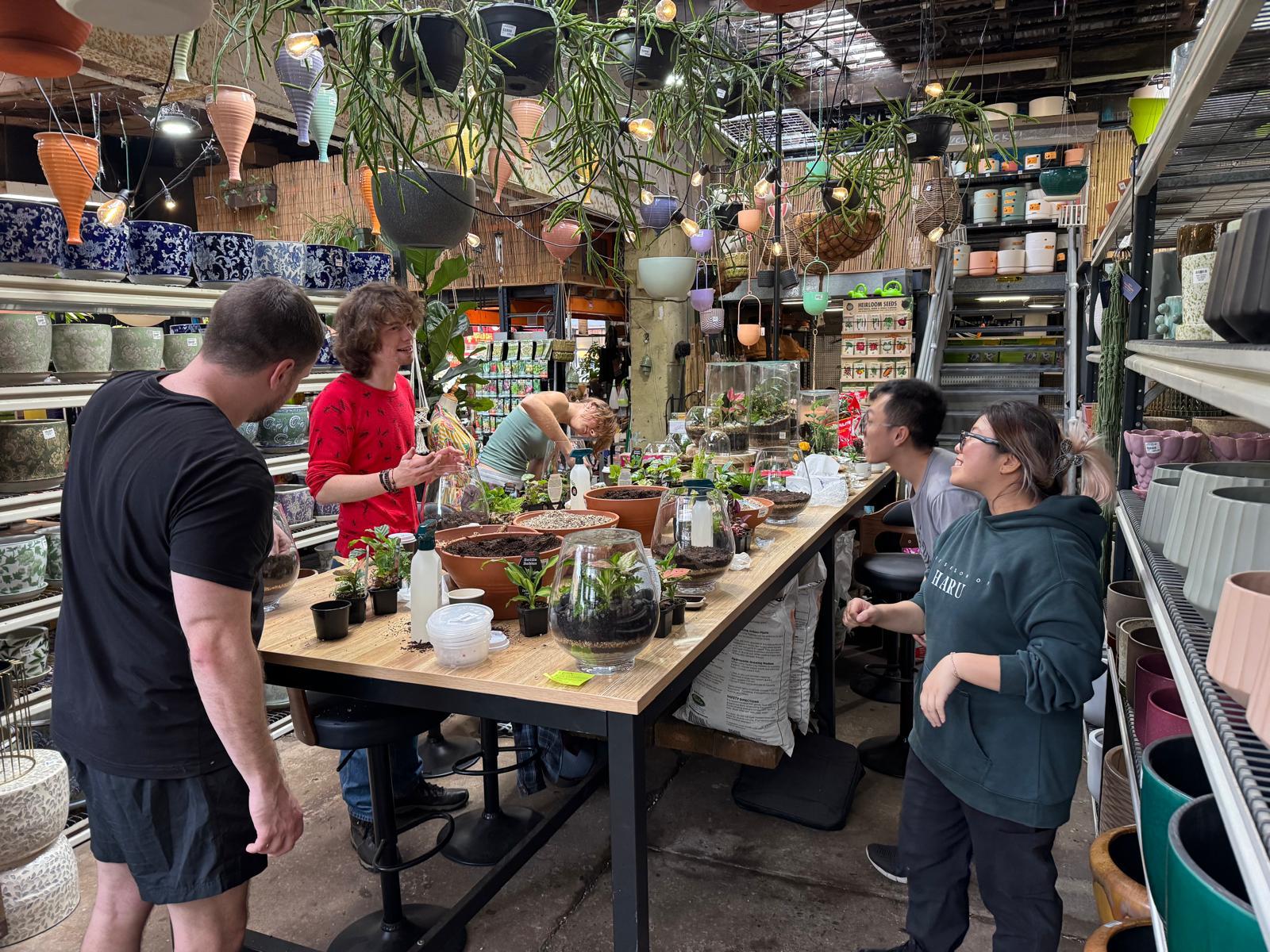 Workshop group building terrariums at Newtown Garden Market plant hall