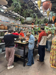 Terrarium workshop attendees placing plants at Newtown Garden Market