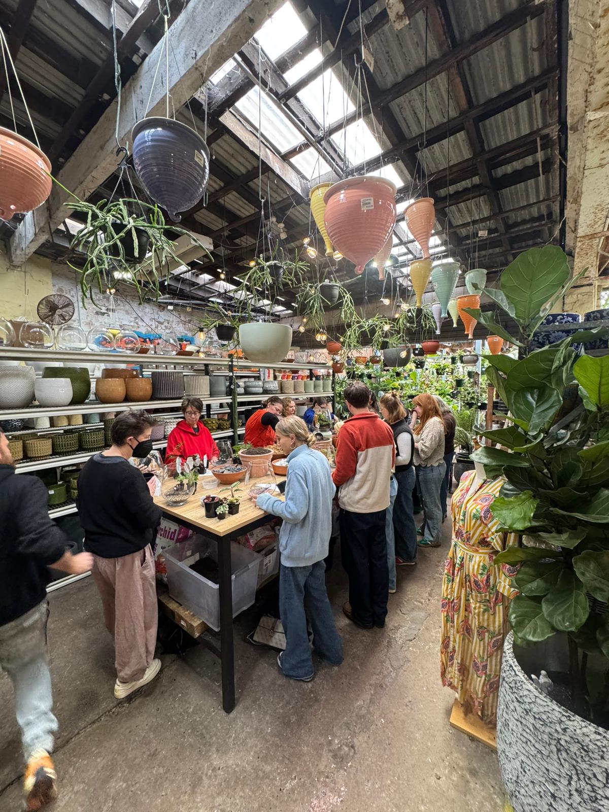 Terrarium workshop attendees working at Newtown Garden Market