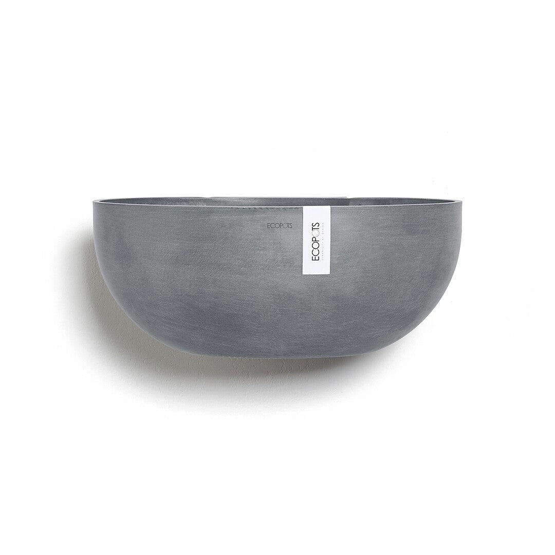 Ecopots Sofia Wall Planter 43cm styled with a plant in situ