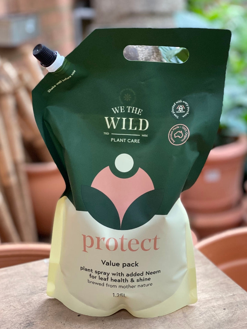 We the Wild Protect Value Pack 1.25l front packaging